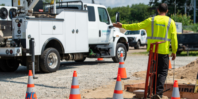 a CT Water employee and truck on site doing some work